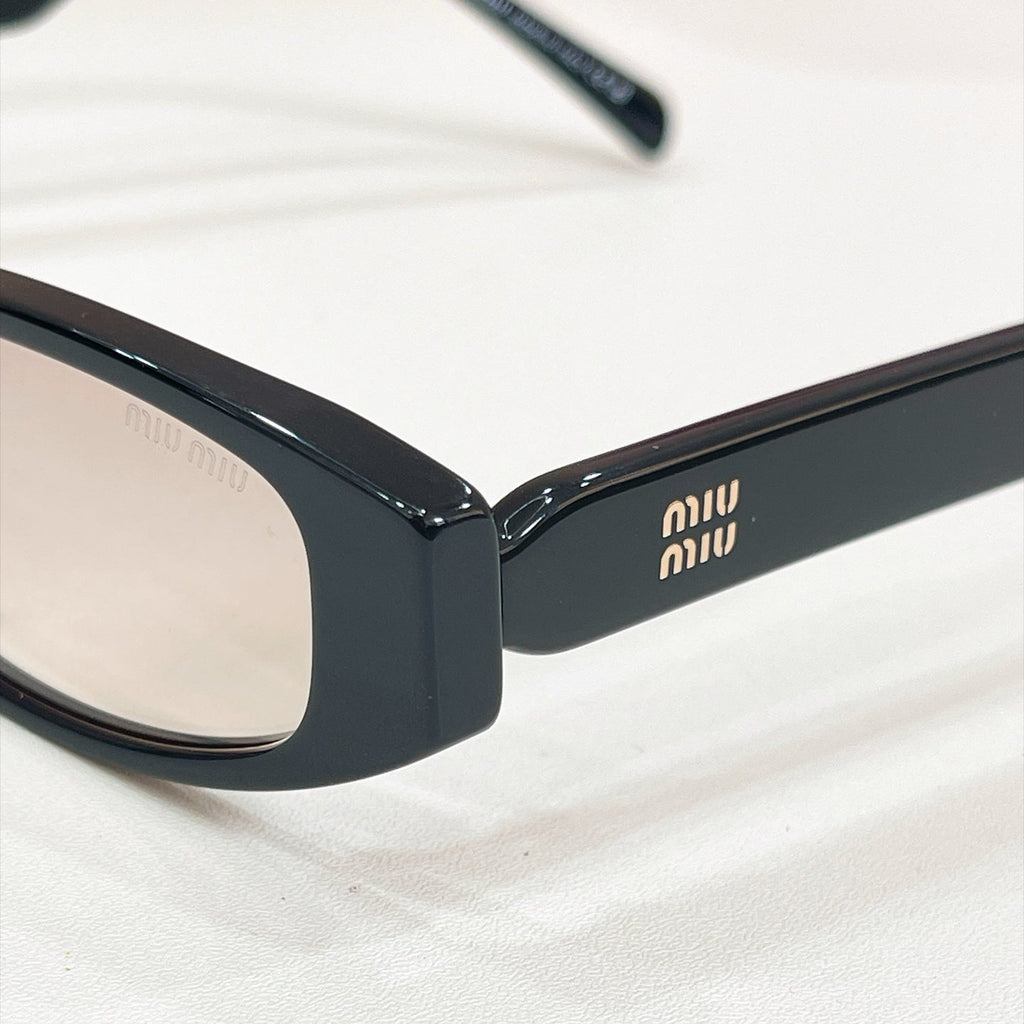 Miu Miu MU 06ZV Sunglasses